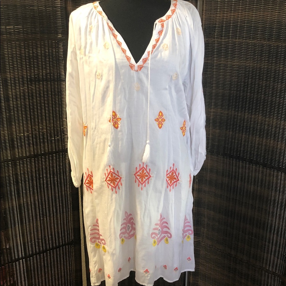 Chic White Dress with Vibrant Embroidery